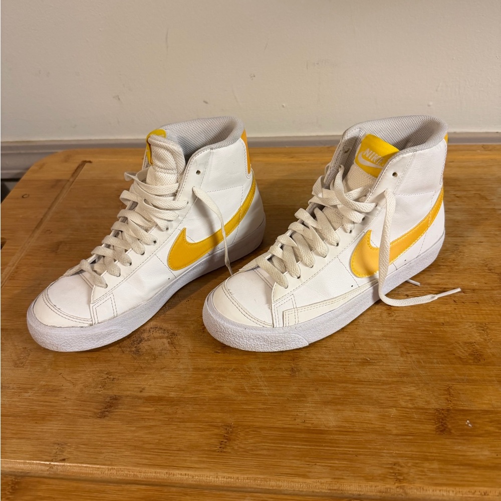 Nike White Sneakers with Yellow and Orange Insole Accents